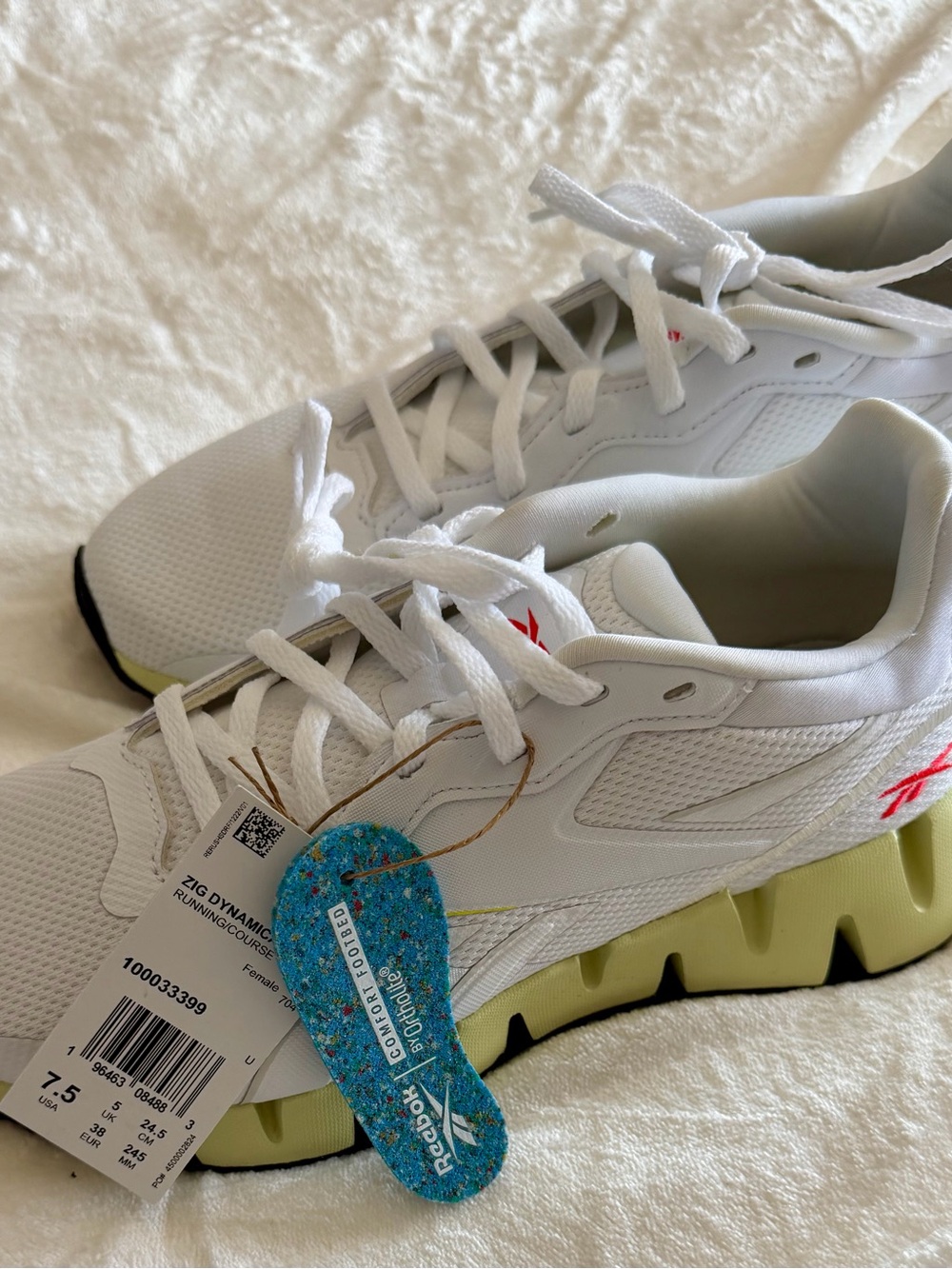 Reebok White Sneakers with Pale Green Sole and Pink Logo